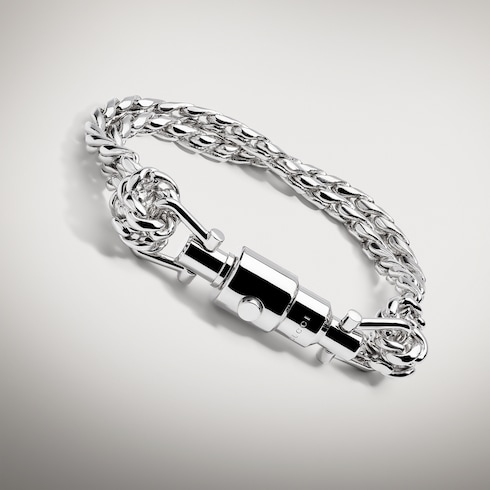 Bracciale a catena con chiusura a pistone