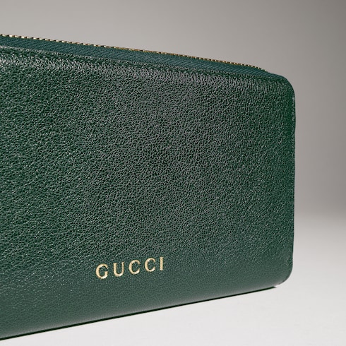 Brieftasche mit Rundumreißverschluss und Gucci Schriftzug