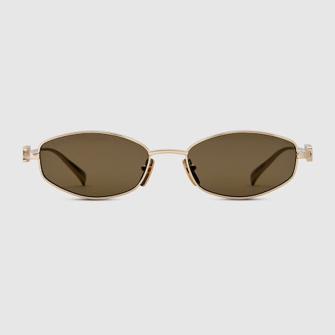Oval frame sunglasses in gold-toned | GUCCI® US