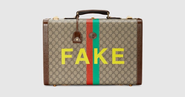 fake gucci holdall