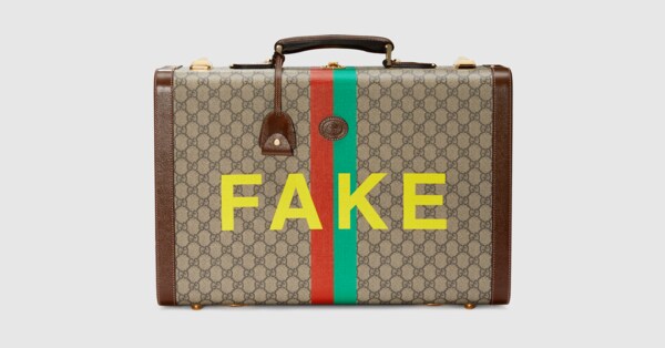 gucci carry on luggage with wheels