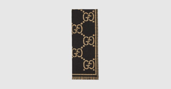 Sciarpa in lana GG a quadri in nero e beige | GUCCI® IT