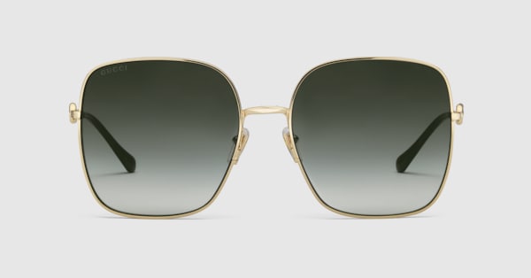 Square-frame sunglasses in gold metal and grey | GUCCI® AU display picture 2