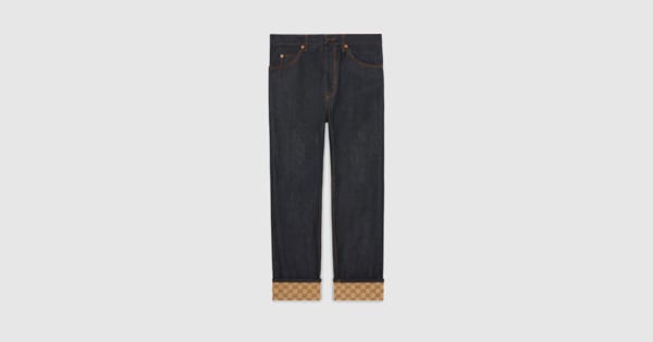 Denim trousers with cuffs in dark blue | GUCCI® ZA