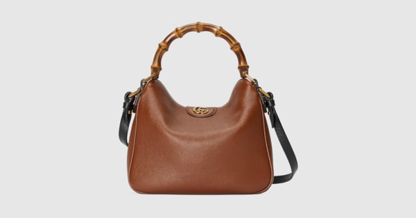 Gucci Wicker Picnic Bag dark brown leather accents shoulder strap and snap  closures light brown leather interior with one zip pocket