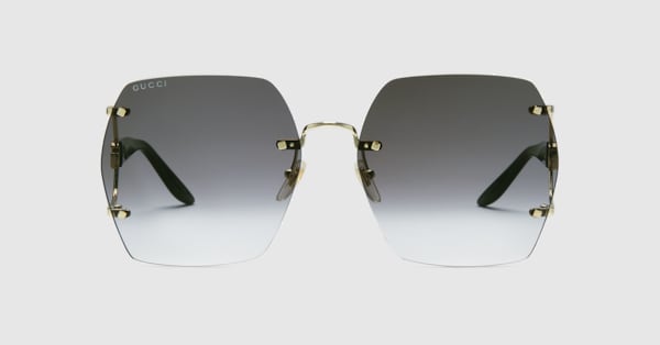 Geometric frame sunglasses in yellow gold-toned metal