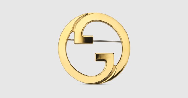 Gucci Blondie brooch in yellow gold-toned metal | GUCCI® SI