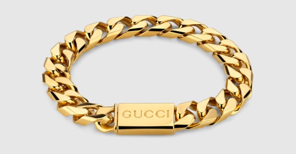 Gucci Script chain bracelet in yellow gold-toned metal | GUCCI® US