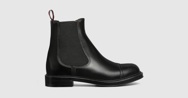 Men s boot with Web detail in black shiny leather GUCCI US