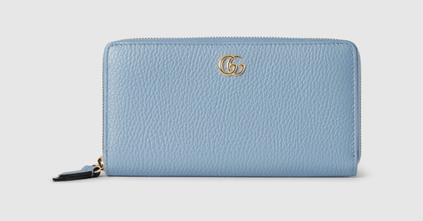 Bi-color GG Marmont zip around wallet in light blue leather