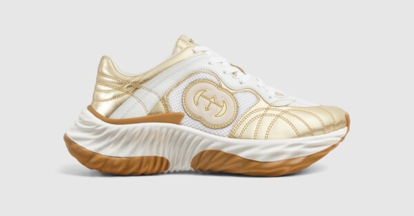 Women's Gucci Ripple sneaker in metallic gold leather