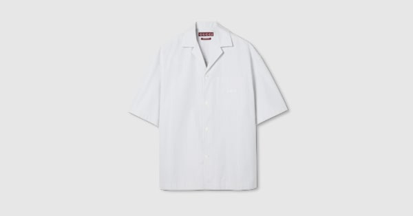 Embroidered striped cotton shirt in white and light blue Embroidered striped cotton shirt in white and light blue