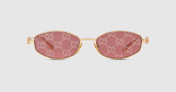 Oval frame sunglasses in gold-toned | GUCCI® US Oval frame sunglasses in gold-toned | GUCCI® US