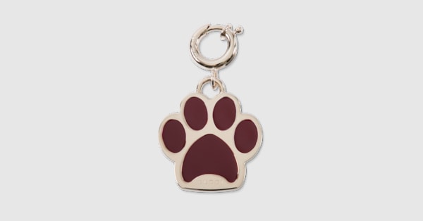 Paw-shaped charm in brass and Rosso Ancora red enamel | GUCCI® US