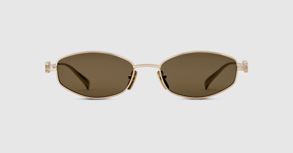 Oval frame sunglasses in gold-toned | GUCCI® ZA
