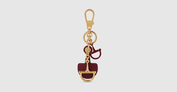 希少✨ OLD GUCCI Horsebit logo keychain Half-Horsebit shaped keychain in Rosso Ancora red leather | GUCCI® US