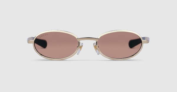Oval frame sunglasses in gold-toned | GUCCI® US