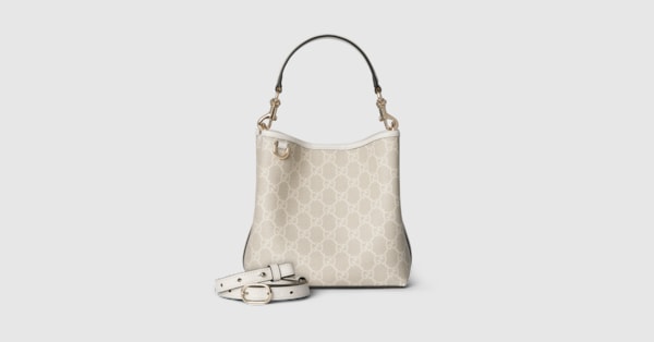 GG Emblem small bucket bag in beige and white GG fabric | GUCCI® US