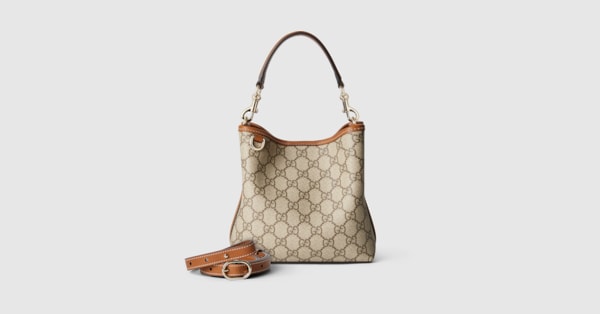 【GUCCI】GG EMBLEM SMALL BUCKET BAG GG Emblem small bucket bag in beige and white fabric | GUCCI® US
