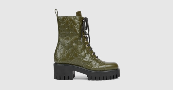 Women's lace-up ankle boot with GG in dark green GG leather