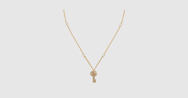 GG Marmont key crystal necklace in gold finish | GUCCI® US GG Marmont key crystal necklace in gold finish | GUCCI® US