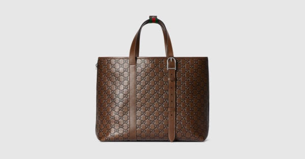 GG Emblem large tote bag in brown and black GG leather | GUCCI® US