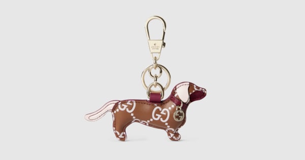 Dog-shaped bag charm in brown and pink GG leather | GUCCI® US