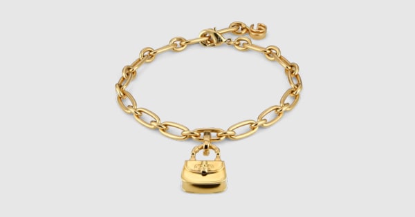 GUCCI ブレスレット Bracelet with Gucci Bamboo 1947 charm in gold-toned brass | GUCCI® US