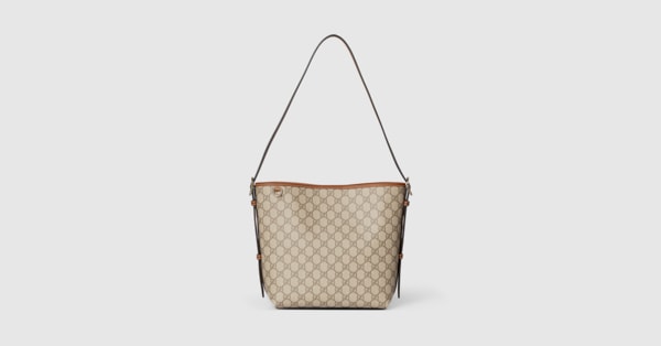 GG Emblem small shoulder bag in beige and brown GG fabric | GUCCI® US