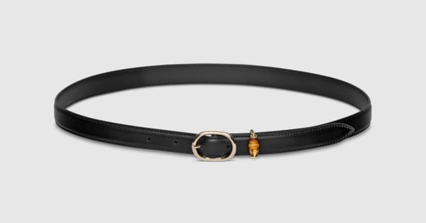 Thin belt with oval buckle in black leather | GUCCI® US