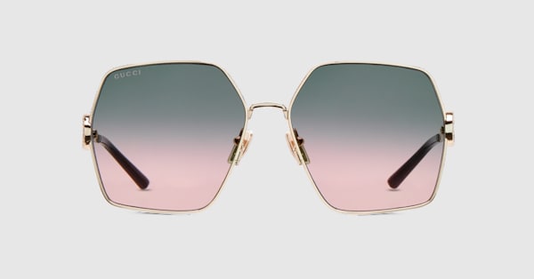 Oval frame sunglasses in gold | GUCCI® US