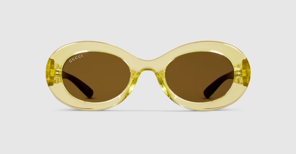 Oval frame sunglasses in transparent light green | GUCCI® US