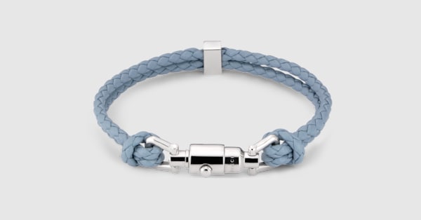 Braided bracelet with piston detail in light blue leather | GUCCI® US