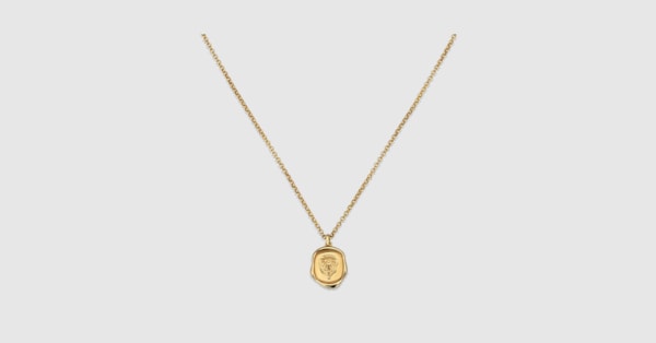 Gucci crest pendant necklace in gold-toned brass | GUCCI® US