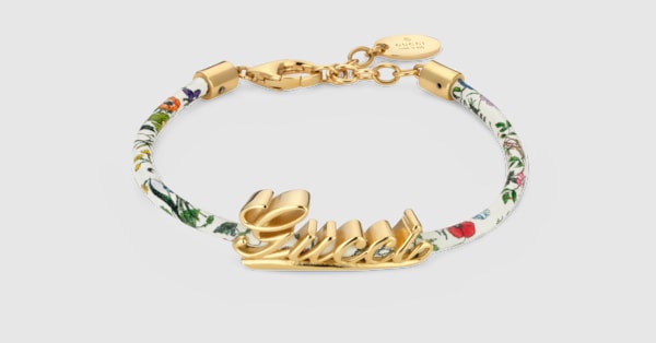 Leather bracelet with Gucci script in white leather | GUCCI® US