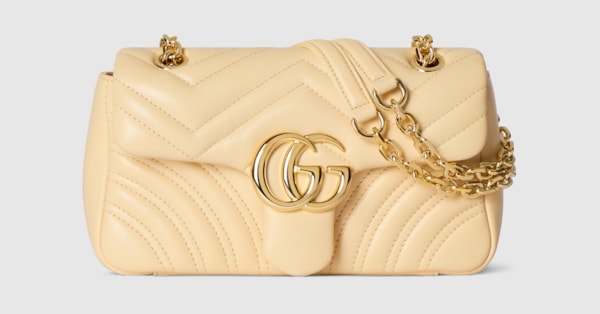 GG Marmont small shoulder bag in light yellow leather | GUCCI® CA