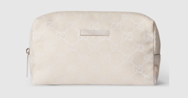 Medium cosmetic case with Gucci plaque in ivory GG canvas | GUCCI® US