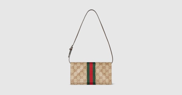 Small pouch with strap and Web in sand and brown GG canvas | GUCCI® US