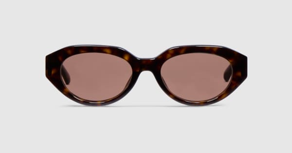 Low nose bridge fit oval sunglasses in brown tortoiseshell | GUCCI® SG