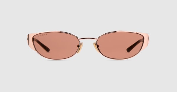 Oval-frame sunglasses in gold-toned | GUCCI® CA
