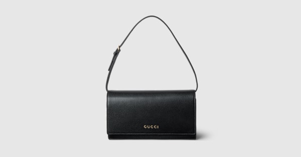 ❗GUCCIポーチ❗②お話し中 グッチ レタリング ミニ ポーチ ・ブラックレザー | GUCCI公式