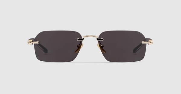 Rectangular-frame sunglasses in gold metal | GUCCI® US