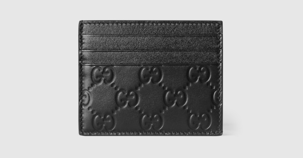 GG Emblem card case in black GG leather | GUCCI® US
