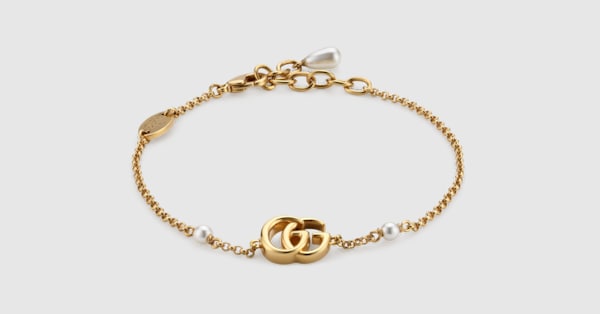 GG Marmont chain bracelet with charm in yellow gold-toned metal