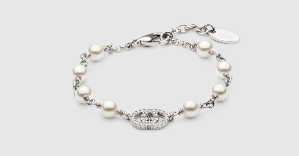 Pearl and crystal charm bracelet in palladium-toned hardware