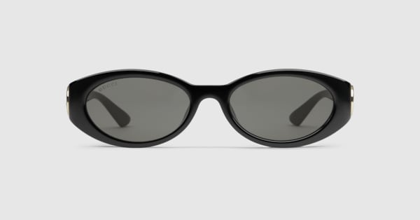 Oval frame sunglasses in black | GUCCI® US