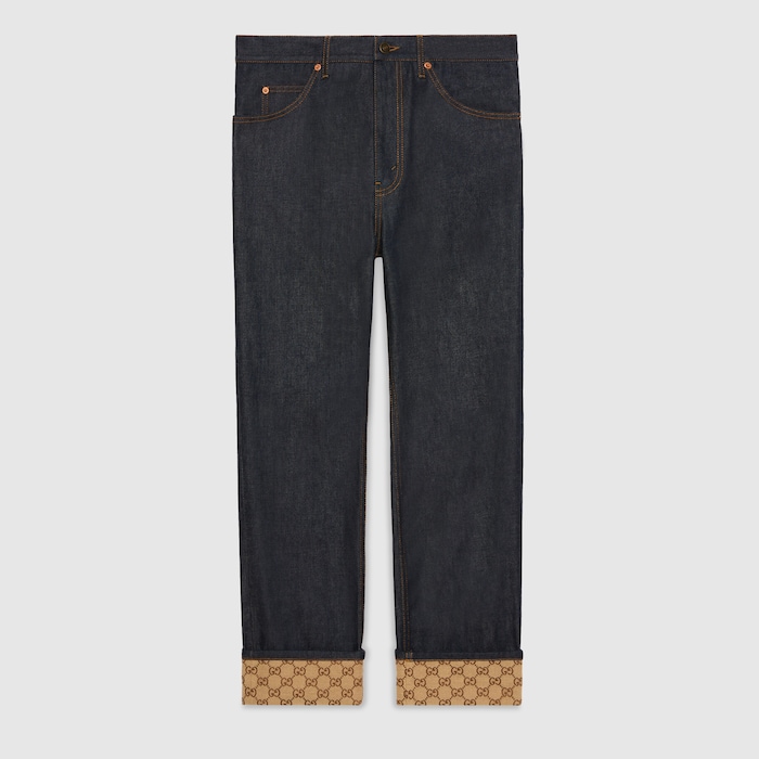Denim trousers with cuffs in dark blue | GUCCI® SI