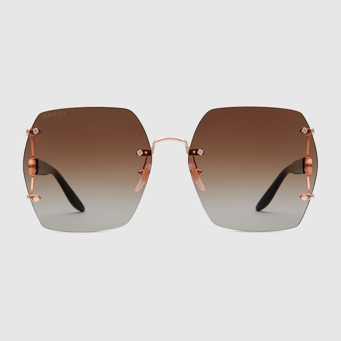 GUCCI EYEWEARリムレス スクエアフレームゴールドトーン(ブラス) Rectangular frame sunglasses in gold-toned metal | GUCCI® US