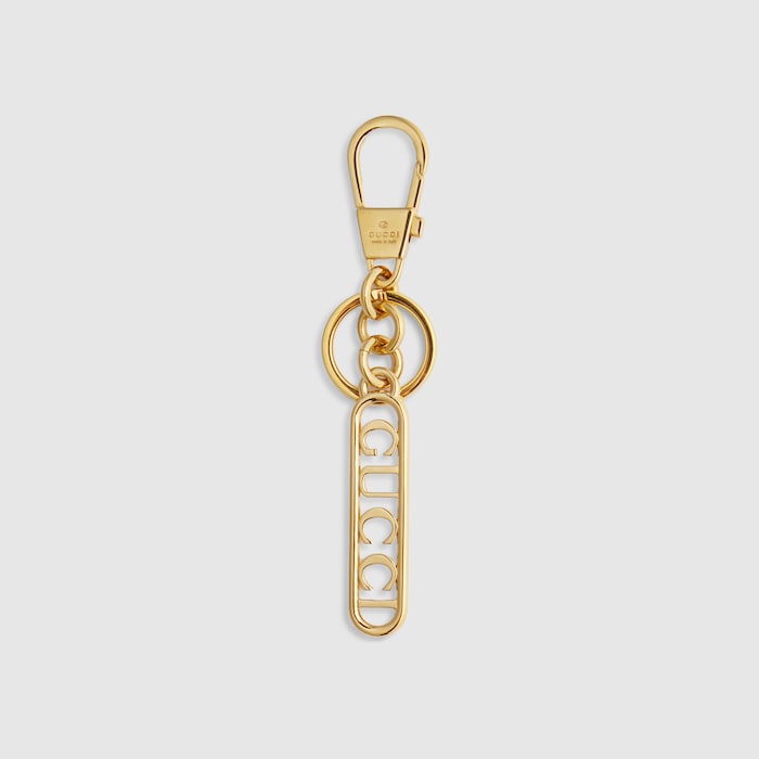 GUCCI スクリプト キーチェーン ・ゴールドトーン ブラス | GUCCI公式