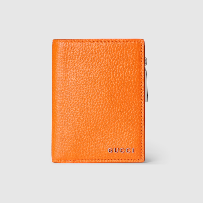 【美品 現行ロゴ】グッチ　二つ折り財布　型押ロゴ　シボ革　オレンジ　ユニセックス 美品 現行ロゴ】グッチ 二つ折り財布 型押ロゴ シボ革 オレンジ ユニ